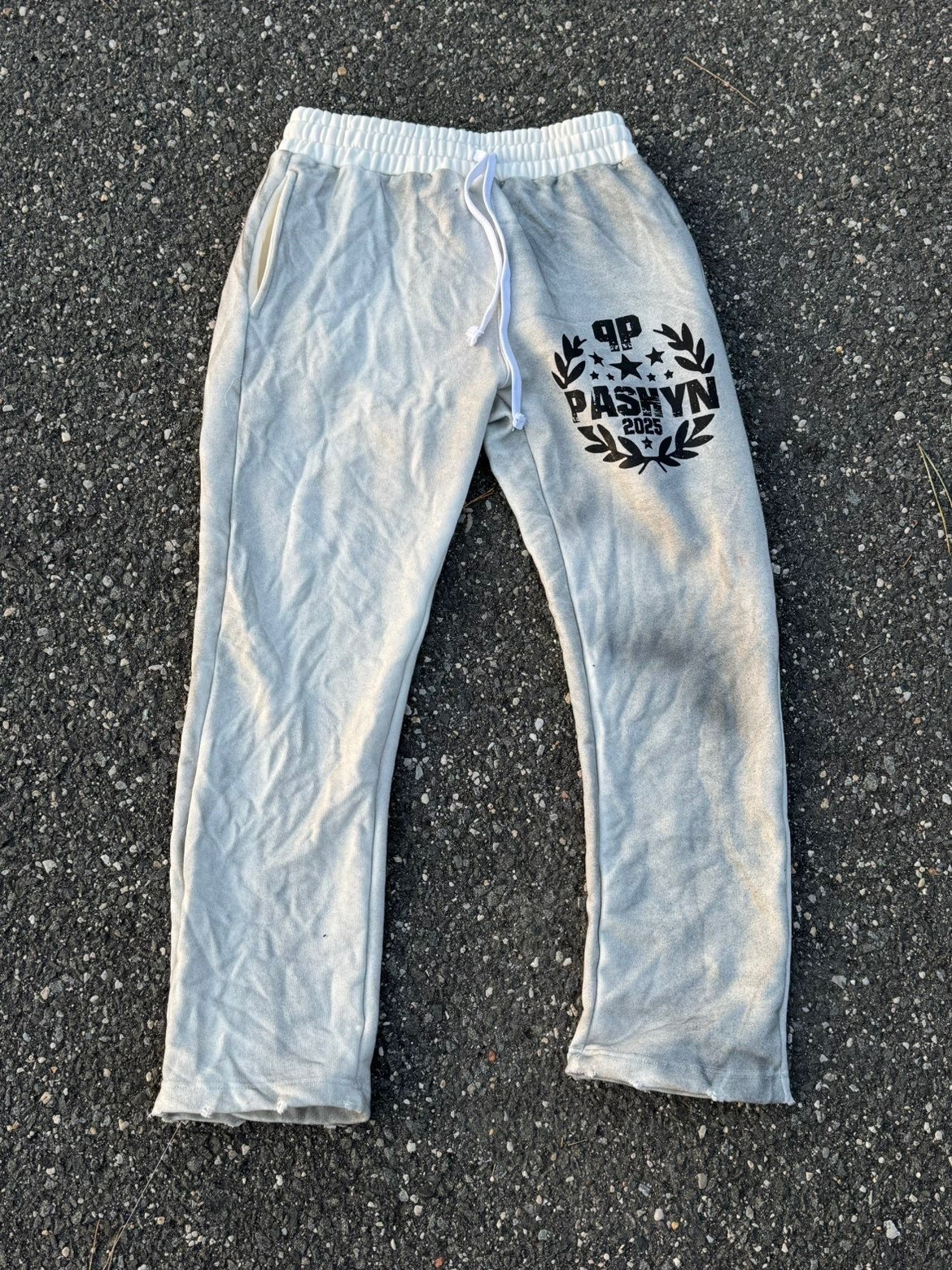 Pashyn’s, dirty washed white tracksuit